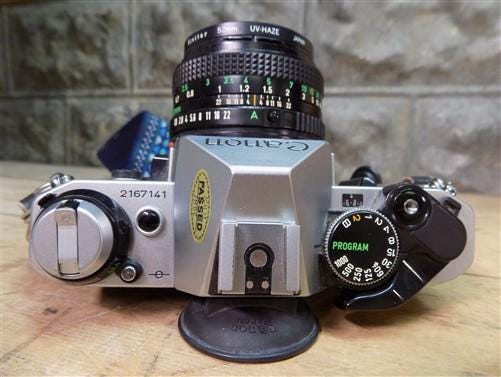 Canon AE-1 & 50 mm 1 : 1.8 Canon Made newest in Japan Lens